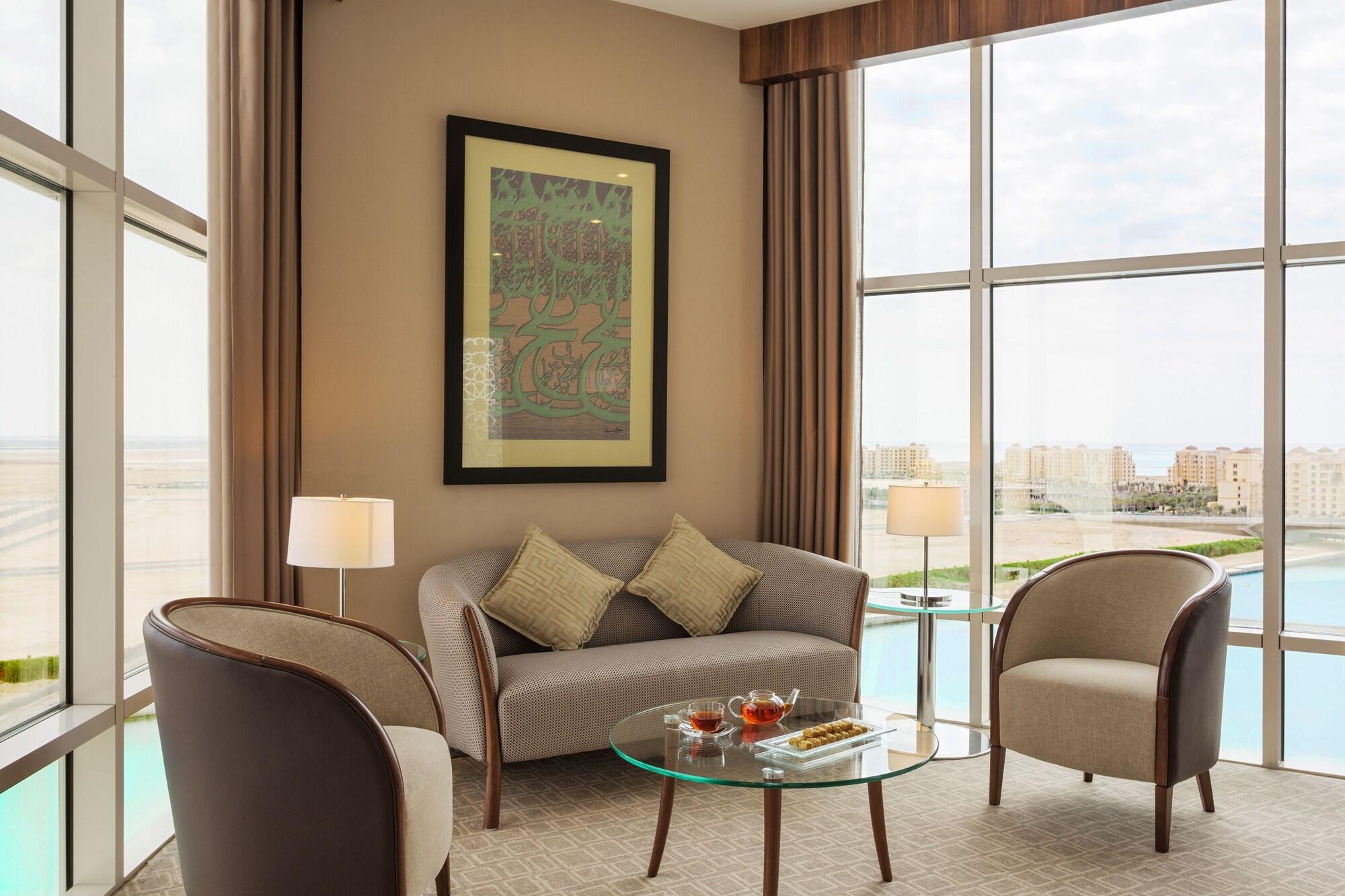 Bay La Sun Hotel And Marina - Emaar King Abdullah Economic City Exterior photo A living room in a suite at the hotel