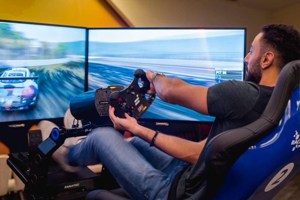 Bay La Sun Hotel And Marina - Emaar King Abdullah Economic City Exterior photo A racing game player using a steering wheel