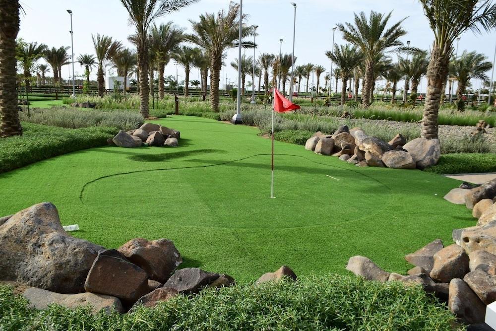 Bay La Sun Hotel And Marina - Emaar King Abdullah Economic City Exterior photo Golf course at Al Forsan National Club