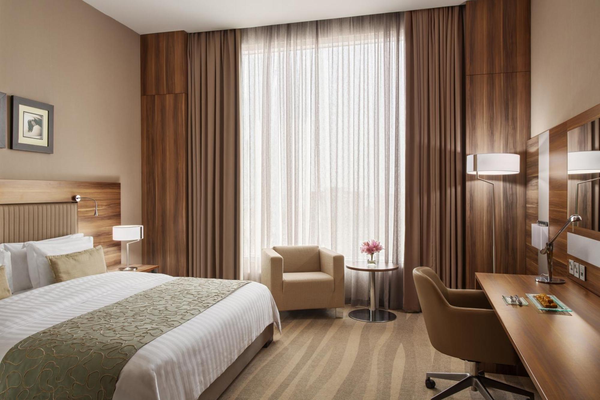 Bay La Sun Hotel And Marina - Emaar King Abdullah Economic City Exterior photo A room at the hotel